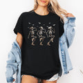 Dancing Cowboy Skeletons And Halloween Bats Fantasy Parade In Moonlit Western Night Scene Graphic Tee