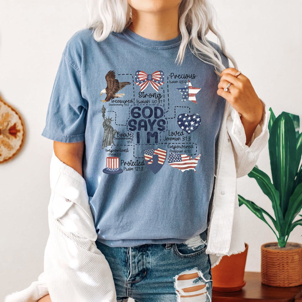God Says I Am Patriotic Protected Strong Powerful Brave Bold Courageous Faithful Comfort Colors Tee