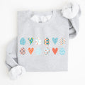Hearts And Eggs Colorful Easter Whimsy Motif Celebration Edition Graphic Sweatshirt