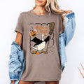 Honk or Treat Cute Goose Halloween Witch Cozy Spooky Season Mascot Illustration For Halloween Party Wear Graphic Tee