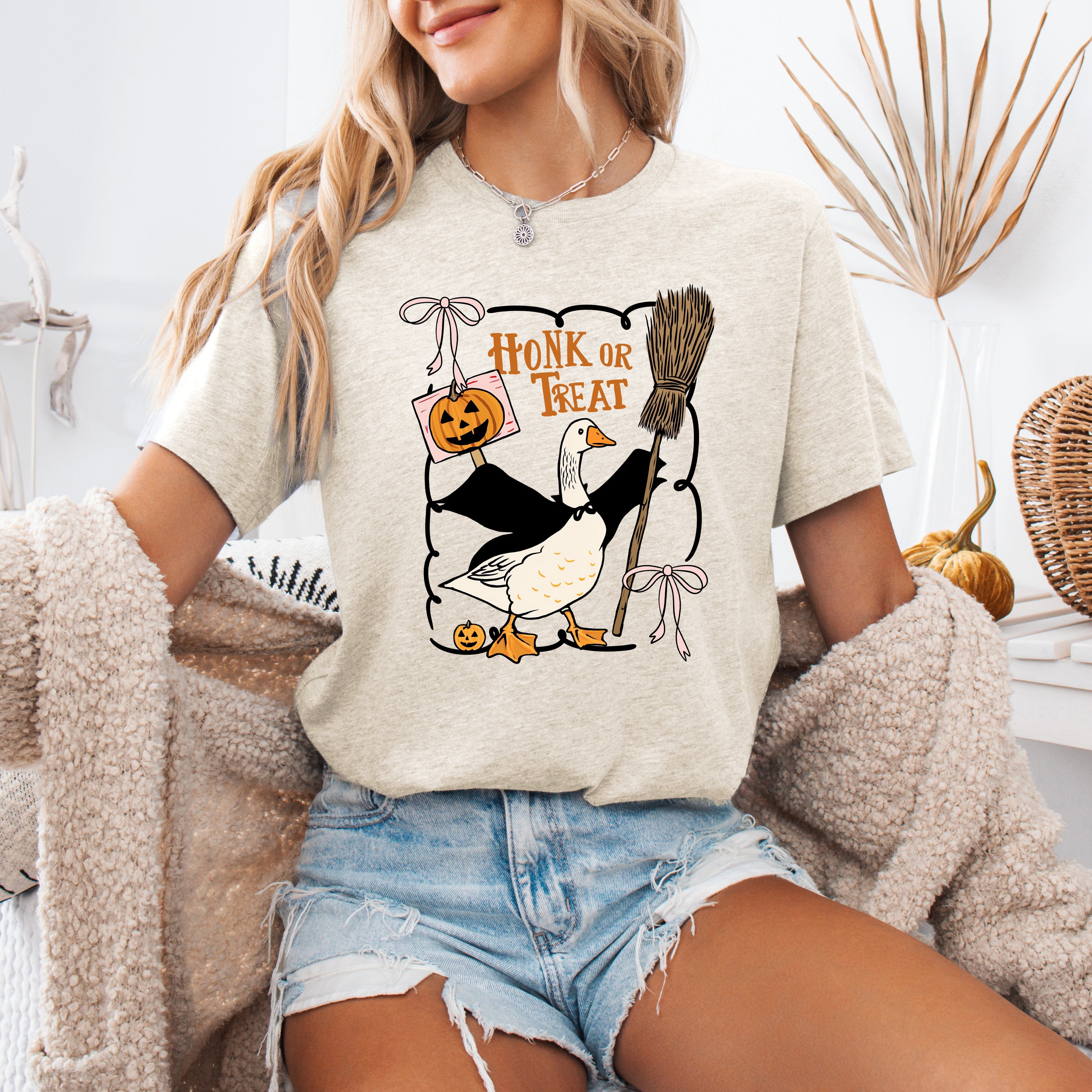 Honk or Treat Cute Goose Halloween Witch Cozy Spooky Season Mascot Illustration For Halloween Party Wear Graphic Tee