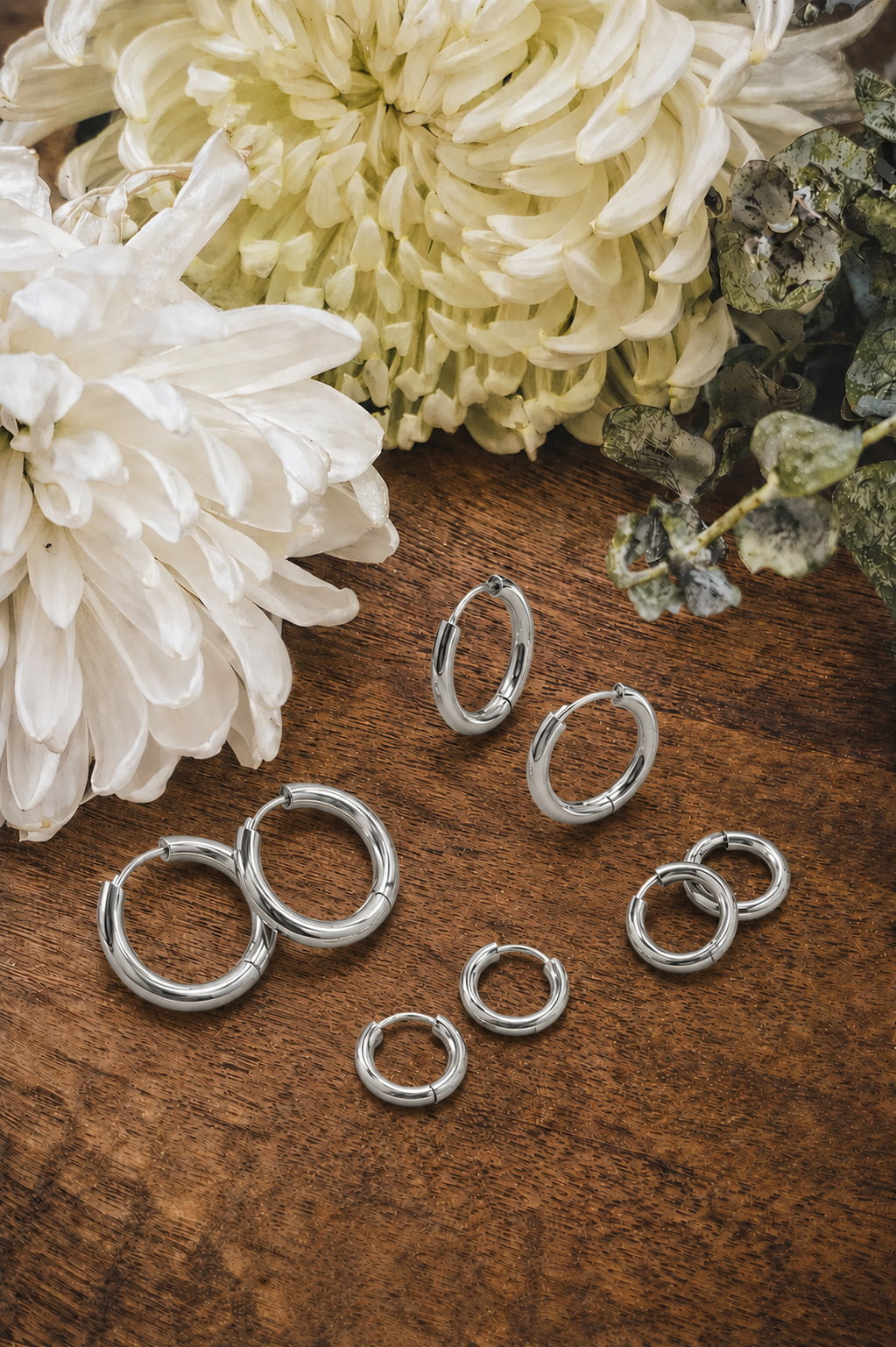 Beautiful 4 Pair Set of Silver Hoop Earrings