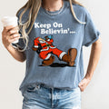 Keep On Believin' Santa Trucking Retro Christmas Holiday Classic Comfort Colors Tee