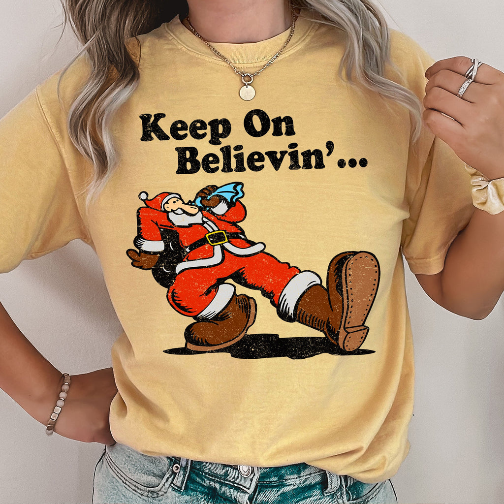 Keep On Believin' Santa Trucking Retro Christmas Holiday Classic Comfort Colors Tee