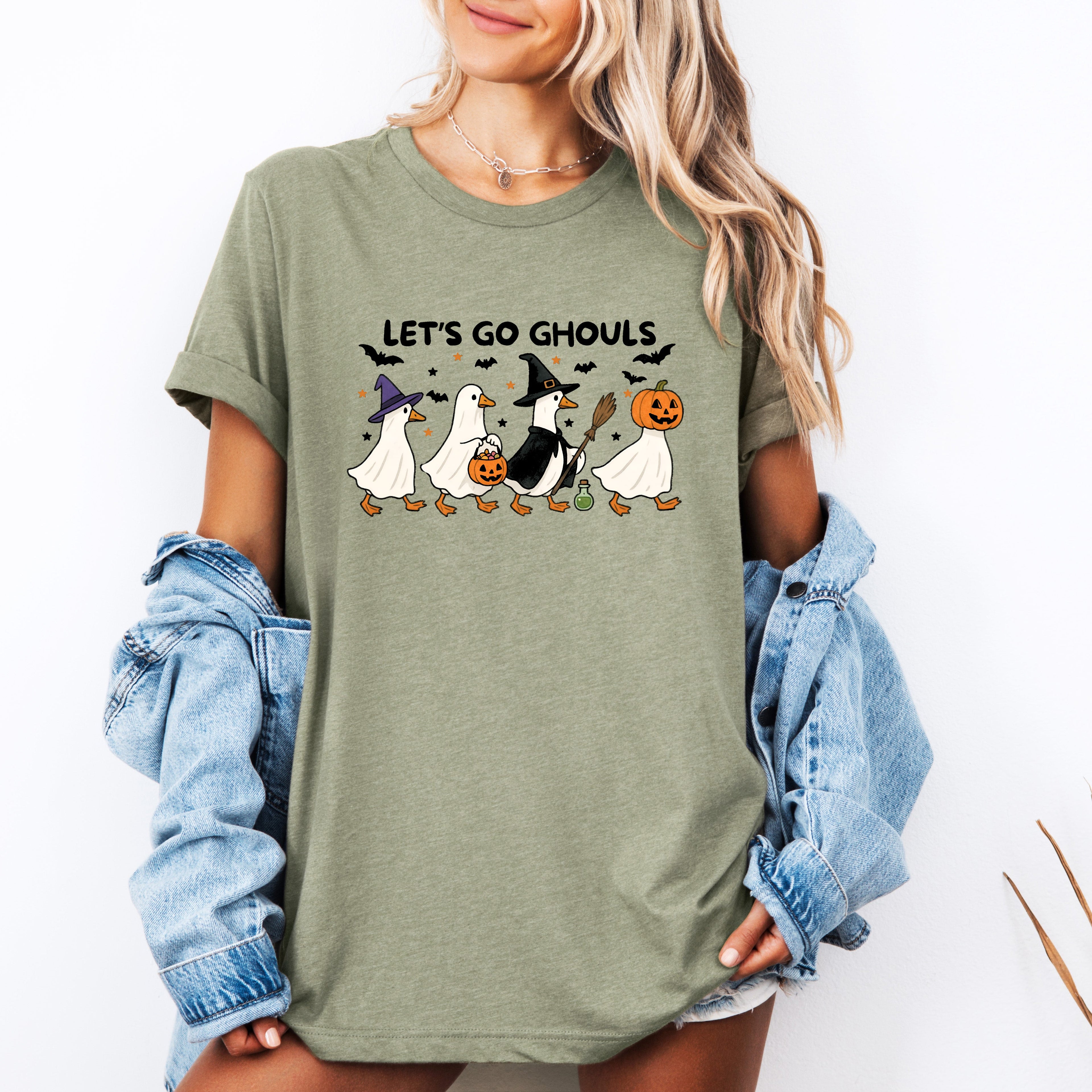 Let's Go Ghouls Geese With Witch Hats For Halloween Night Grinning Goose Parade Graphic Tee