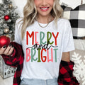 Merry And Bright Retro Text Christmas Cheer Holiday Script Ornament Snowflake Pattern Graphic Tee