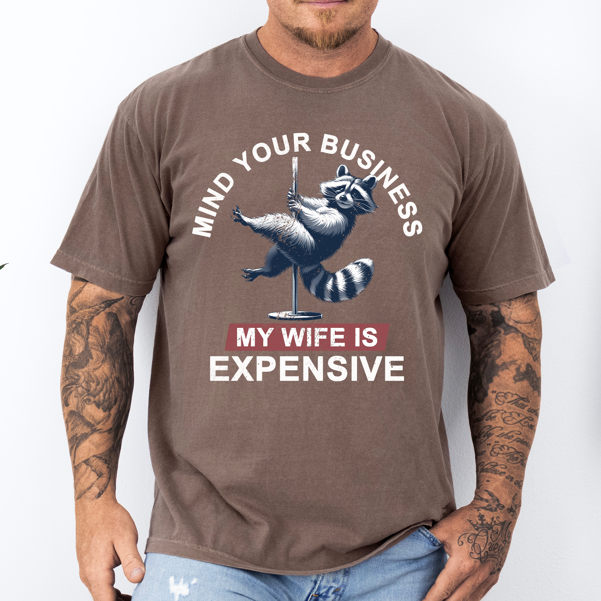 Mind Your Business My Wife Is Expensive Raccoon Dad Humor Graphic Comfort Colors Tee