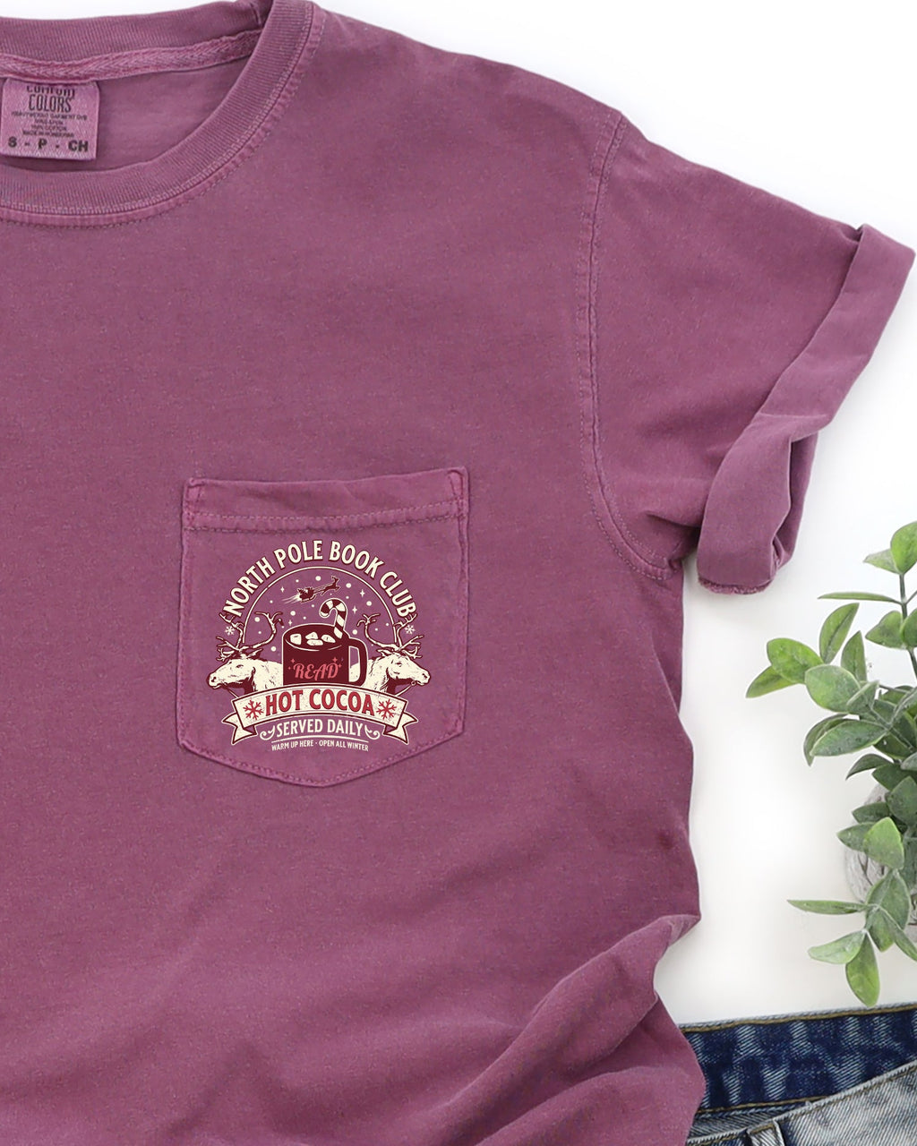 North Pole Book Club Pocket Hot Cocoa Christmas Winter Snow Reindeer Santa Xmas Comfort Colors Tee