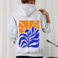 Floral Design With Bold Blues And Oranges And Intricate Petal Patterns For A Standout Look Hoodie