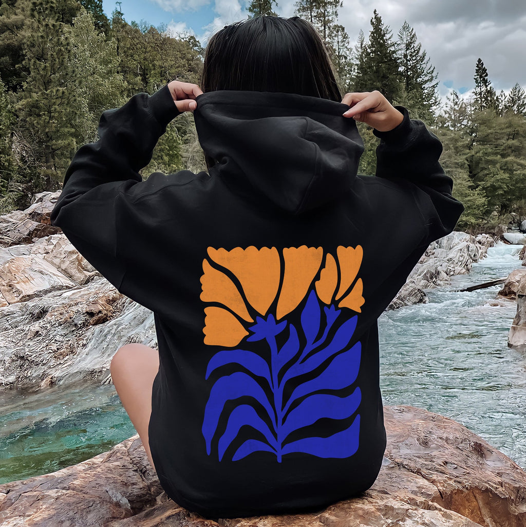 Floral Design With Bold Blues And Oranges And Intricate Petal Patterns For A Standout Look Hoodie