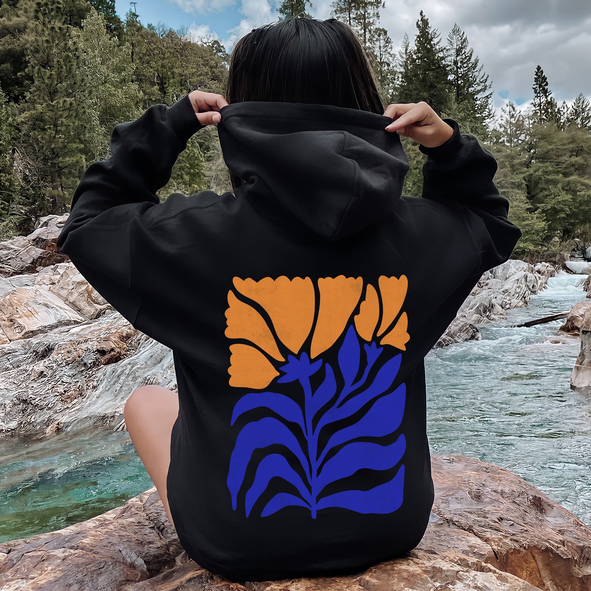 Floral Design With Bold Blues And Oranges And Intricate Petal Patterns For A Standout Look Hoodie