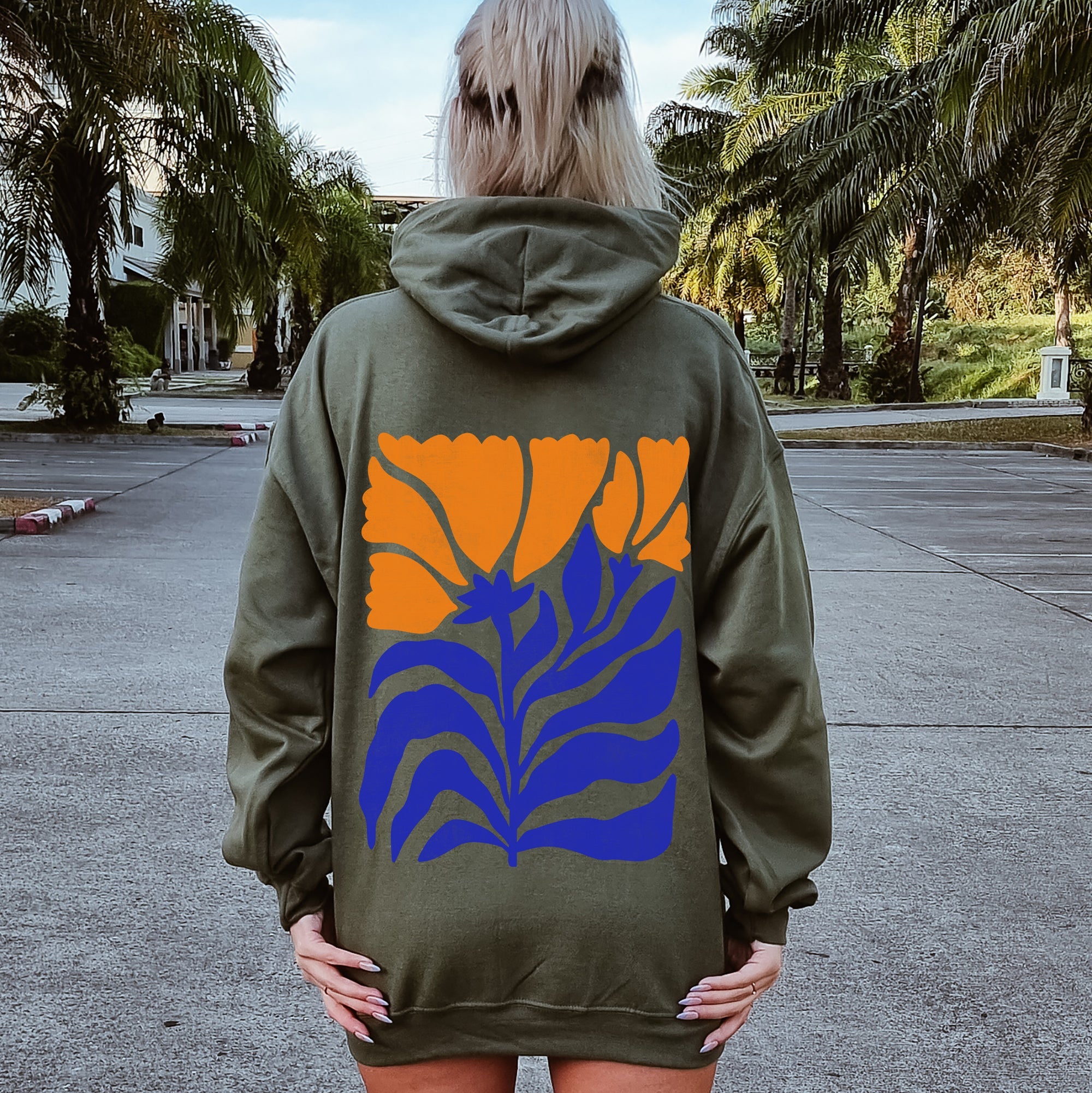 Floral Design With Bold Blues And Oranges And Intricate Petal Patterns For A Standout Look Hoodie