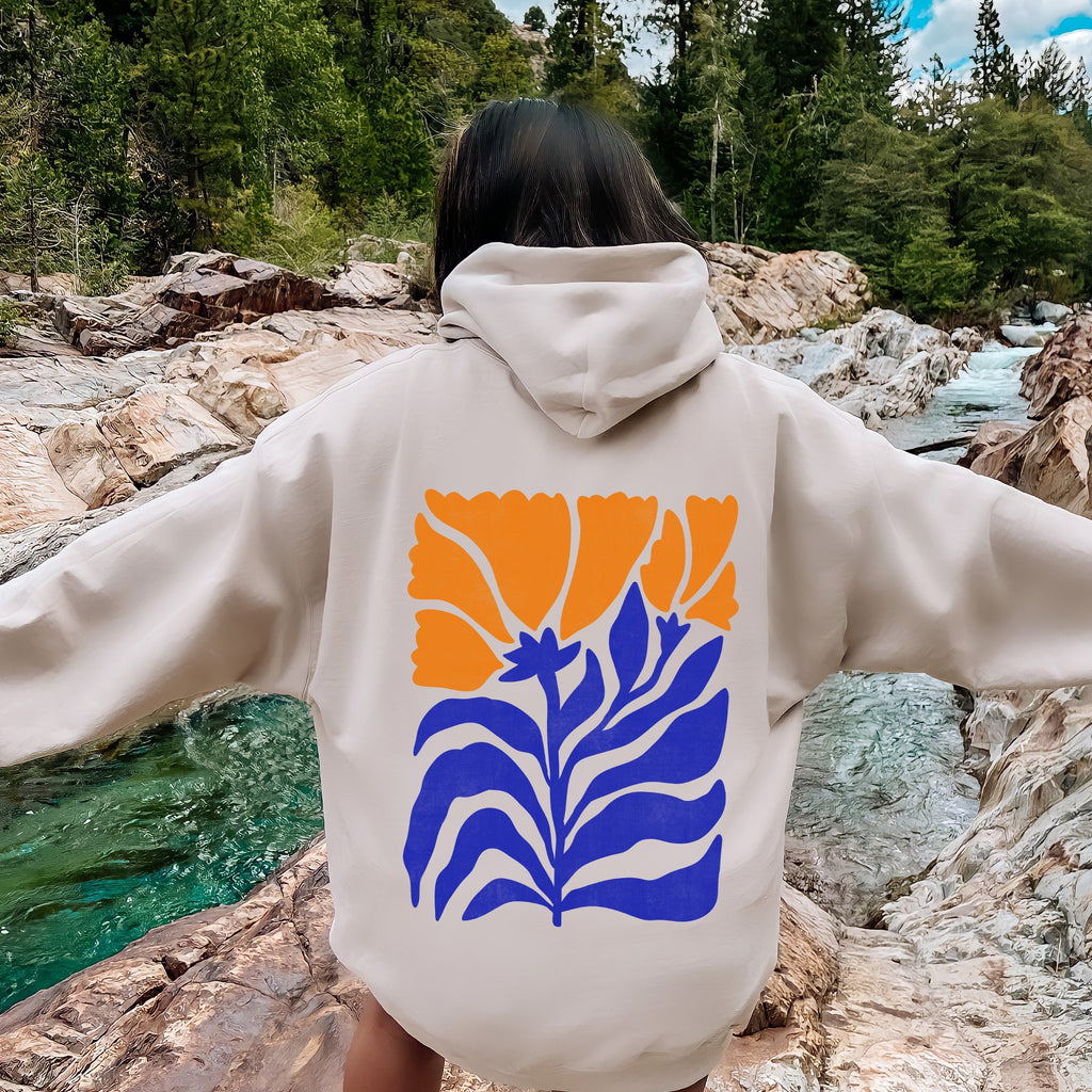 Floral Design With Bold Blues And Oranges And Intricate Petal Patterns For A Standout Look Hoodie