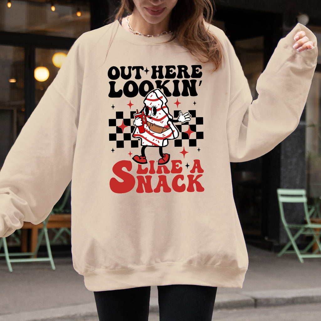 Out Here Lookin Like A Snack Christmas Cake Snow Xmas Santa Holiday Vibes Season Joy Sweatshirt