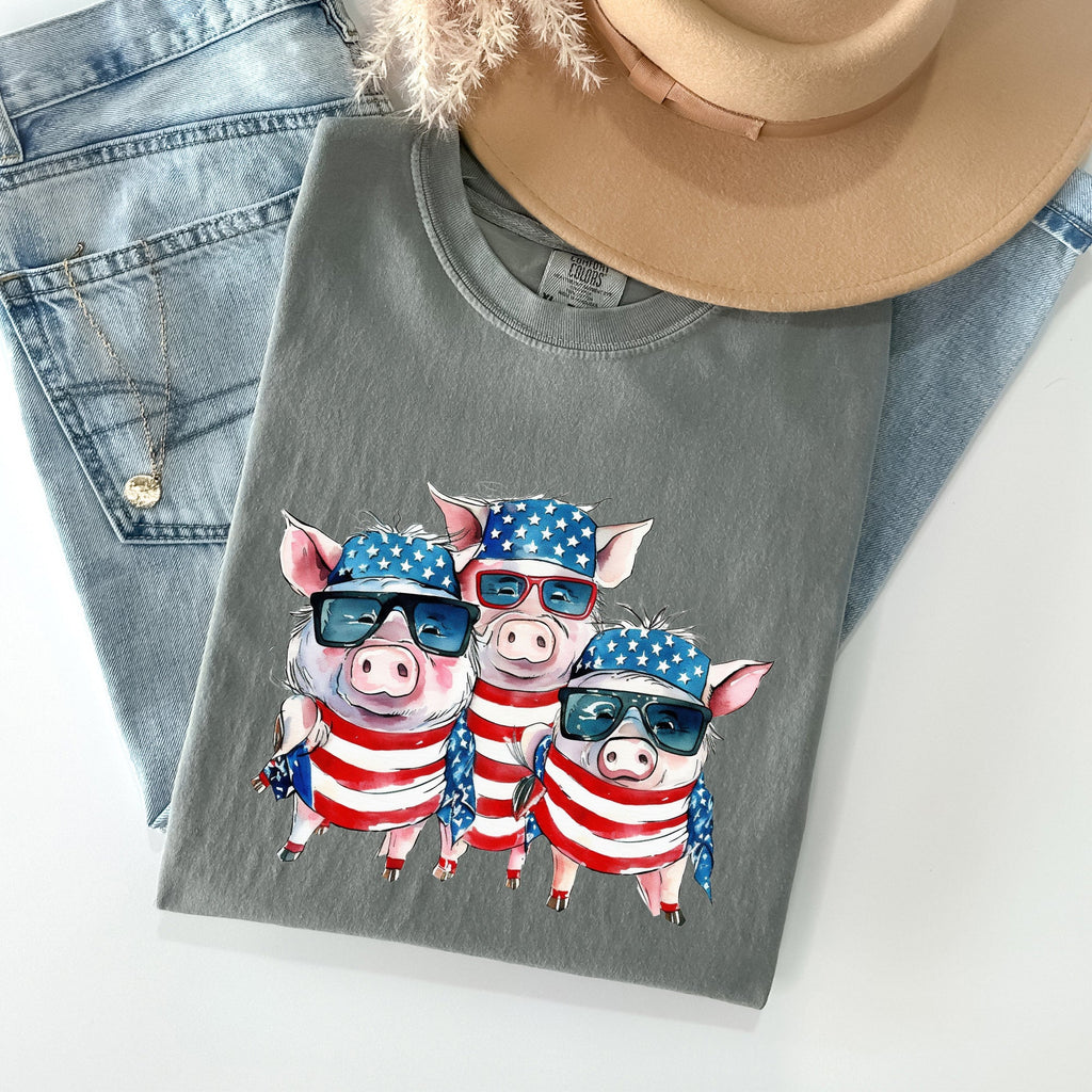 Patriotic Pigs Hippie 4th Of July Celebration With Retro Flag Colors And Classic Americana Vibe Comfort Colors Tee