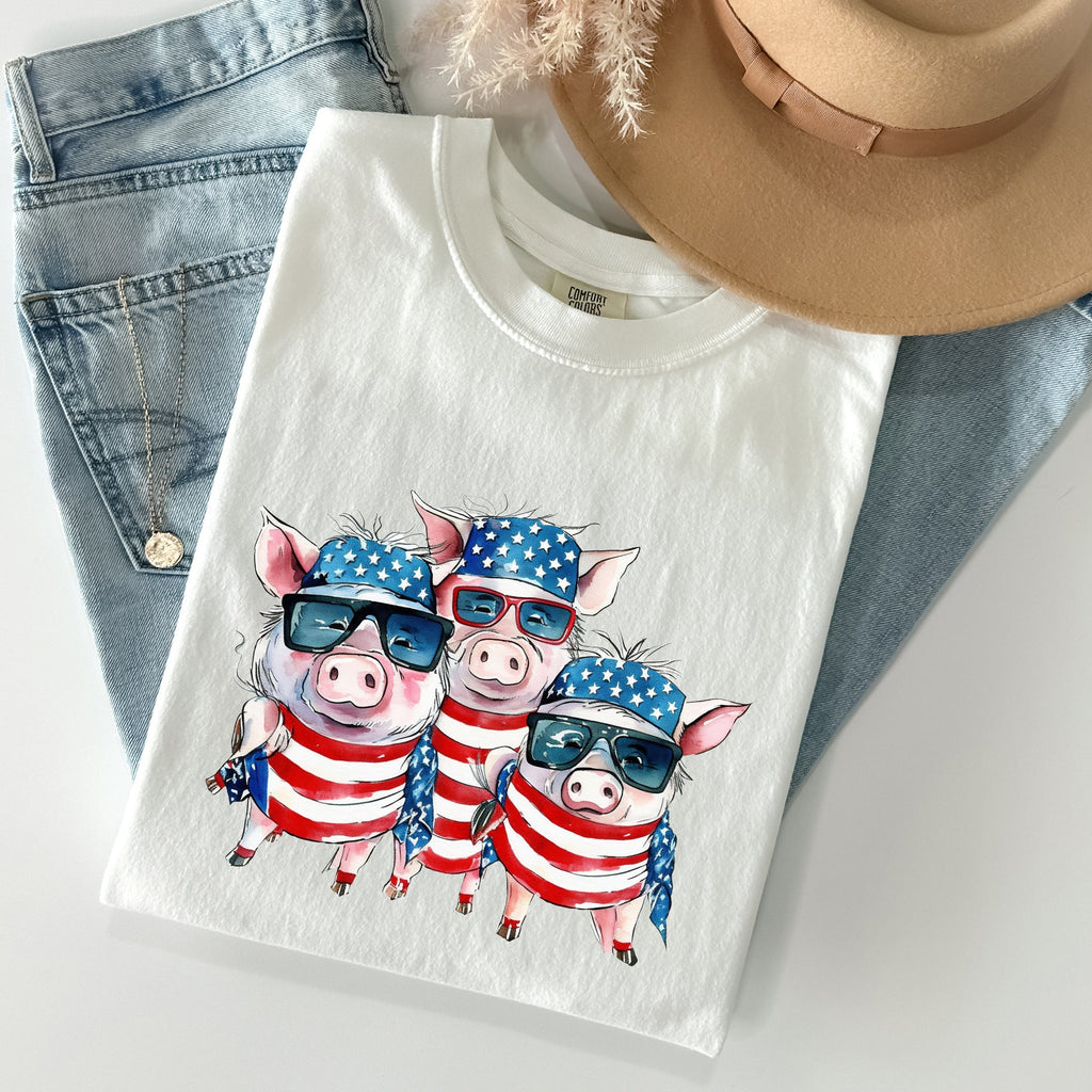 Patriotic Pigs Hippie 4th Of July Celebration With Retro Flag Colors And Classic Americana Vibe Comfort Colors Tee