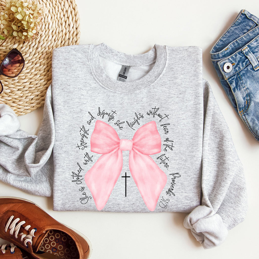 She Is Clothed With Strength And Dignity Proverbs Bows Ribbon Girly Religious Christmas Faith Sweatshirt