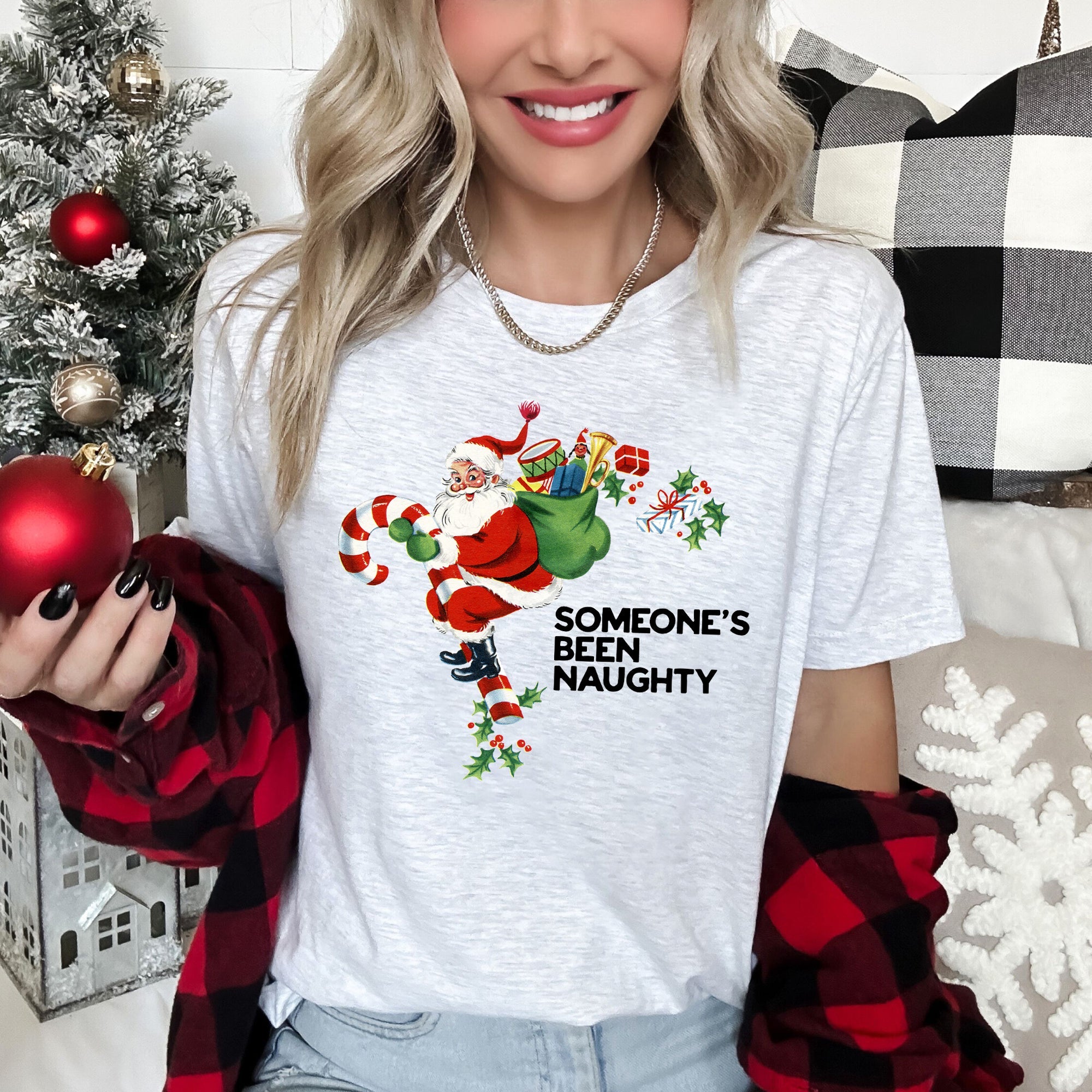 Someone's Been Naughty Santa Retro Christmas Graphic Tee With Vintage Illustration