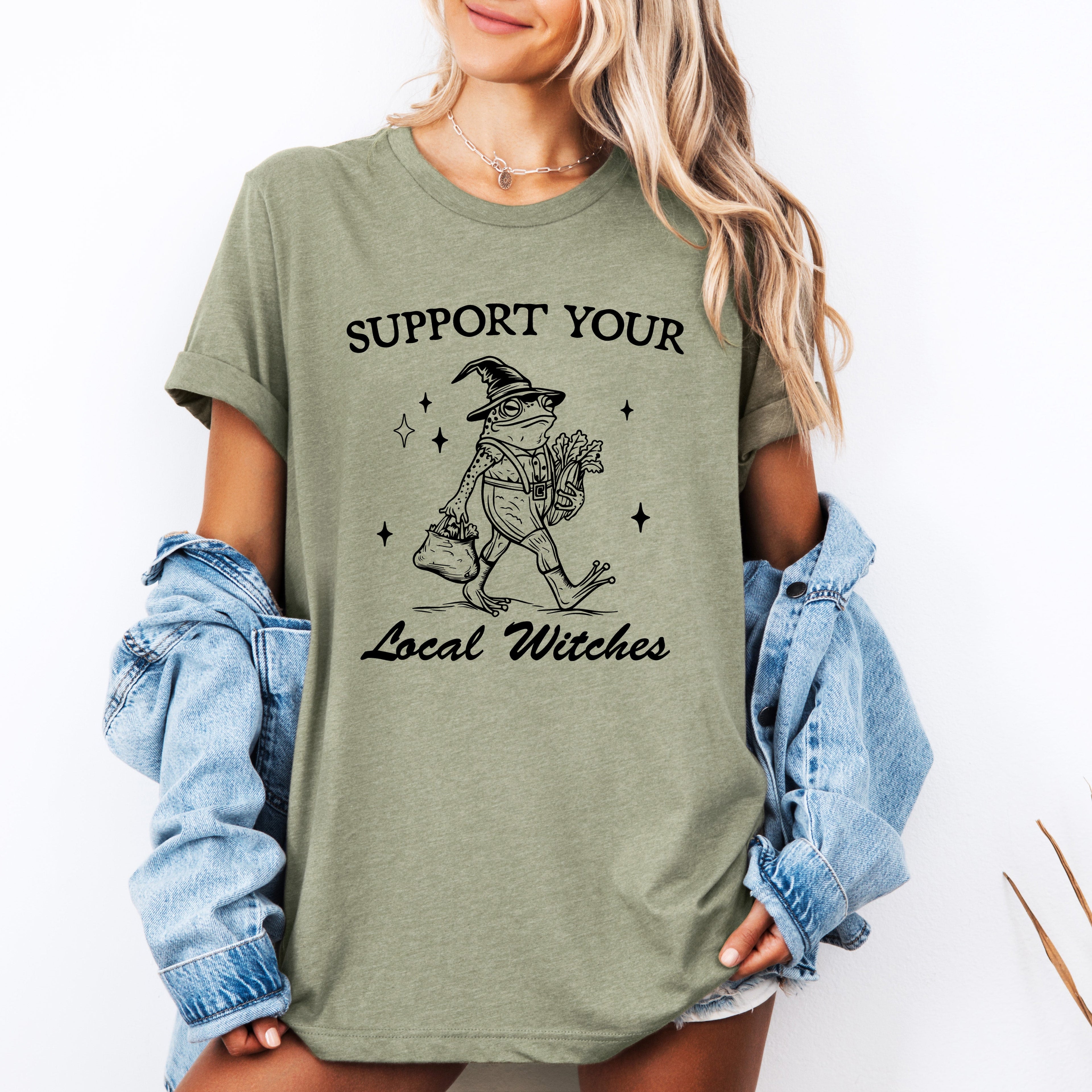 Support Your Local Witches Frog Halloween Witchy Spooky Nighttime Charm Graphic Tee