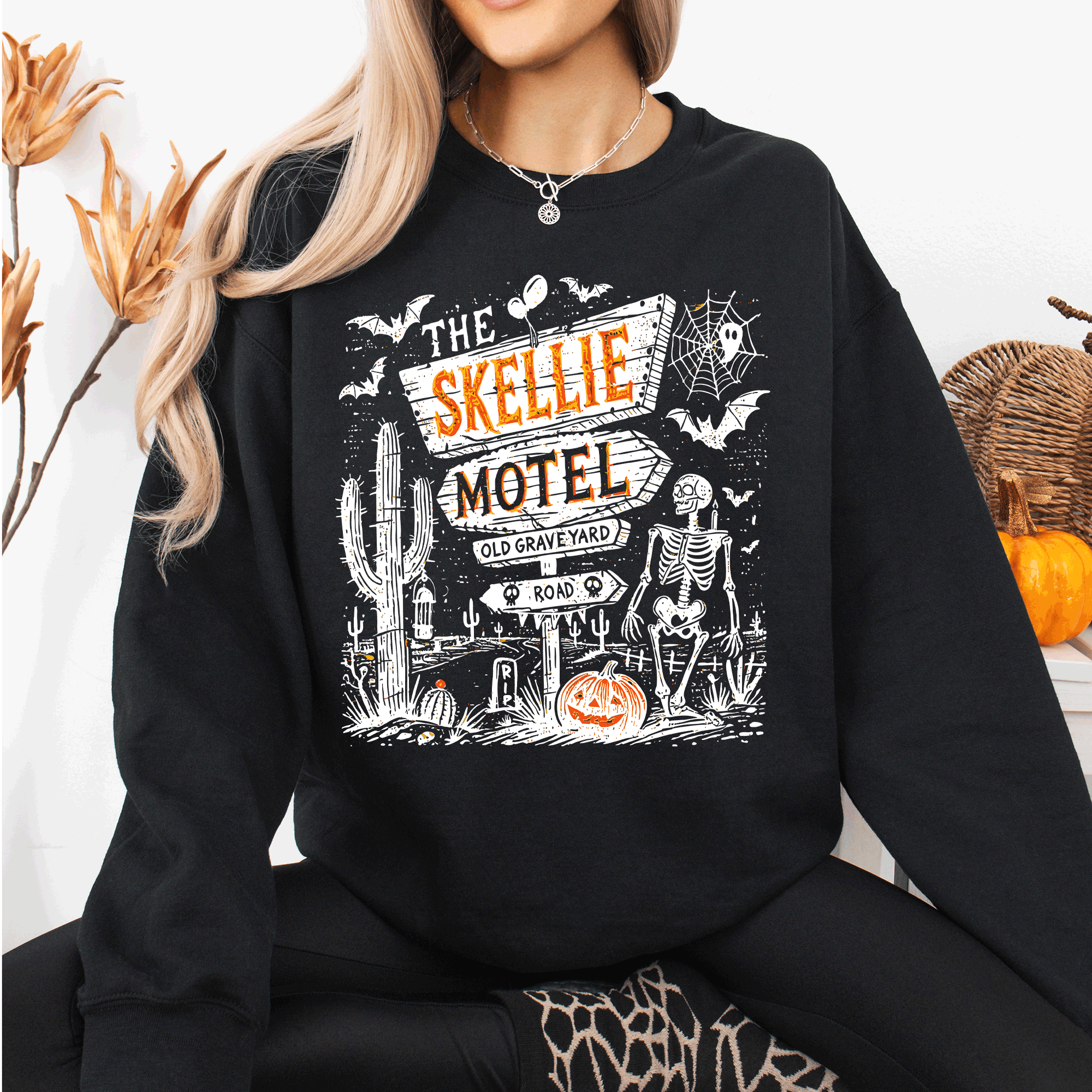 The Skellie Motel Skeleton Halloween Night Haunting Edition With Spooky Vibes And Retro Motel Aesthetic Sweatshirt