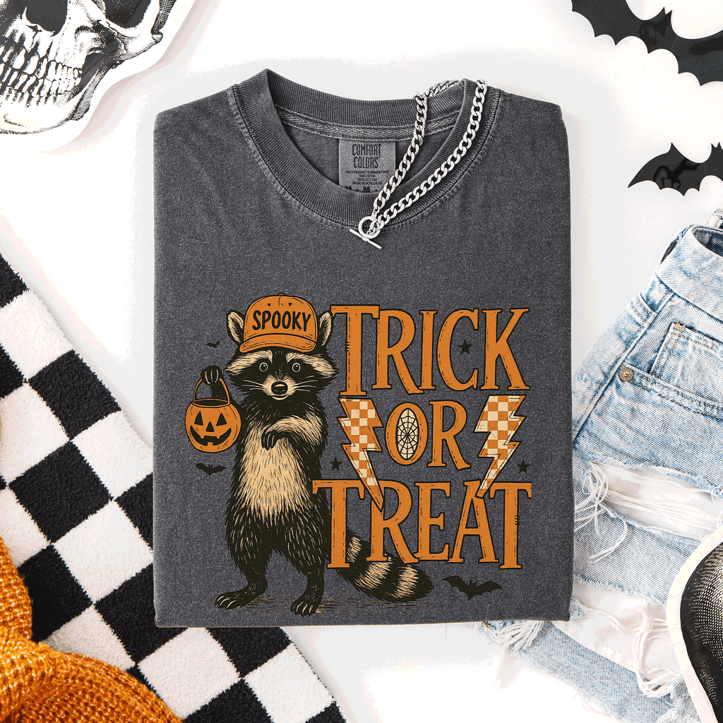 Trick or Treat Raccoon Halloween Mischief With Skeletons Ghosts Cats And Pumpkins Comfort Colors Tee