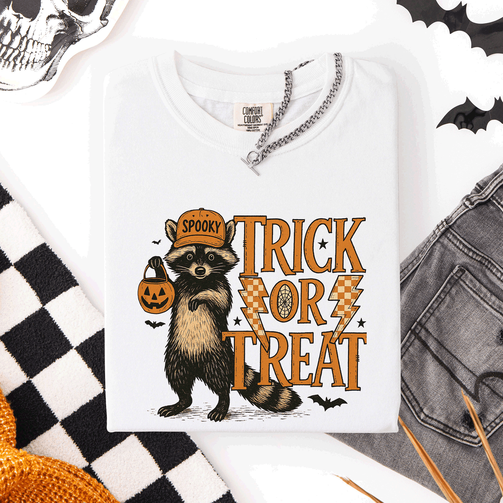 Trick or Treat Raccoon Halloween Mischief With Skeletons Ghosts Cats And Pumpkins Comfort Colors Tee