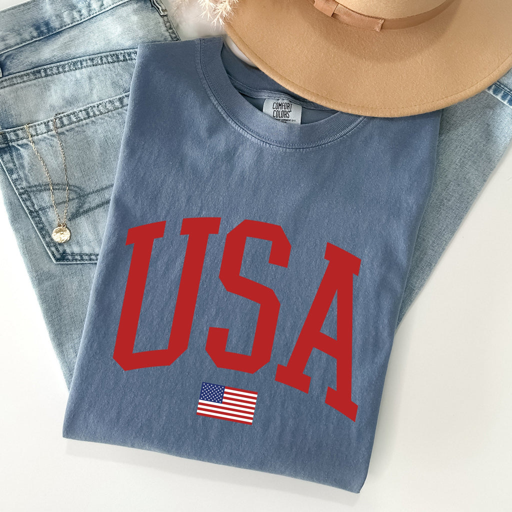 USA Flag Patriotic American Pride Print Emblem With Bold Stars And Stripes Across The Banner Comfort Colors Tee