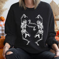 Dancing Skeletons Vintage Halloween Night Parade Whimsical Skeleton Dance Artwork Sweatshirt